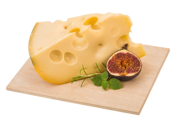 Maasdam cheese with fig — Stock Photo, Image