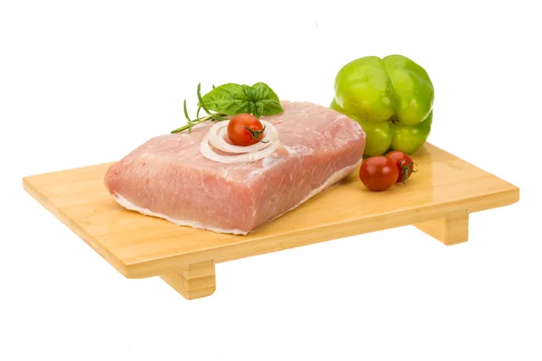 Raw pork with onion, basil and rosemary — Stock Photo, Image