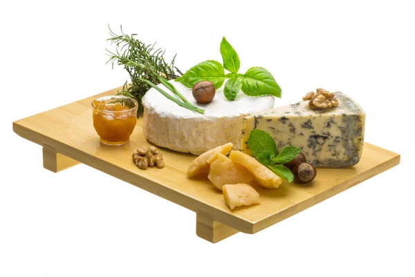 Assorted cheese - brie, dor blue and hard old yellow cheese — Stock Photo, Image