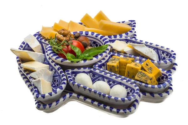 Variety cheese assortment with nuts and herbs — Stock Photo, Image