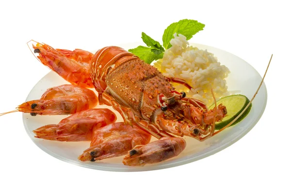 Spiny lobster, shrimps and rice — Stock Photo, Image