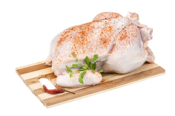 Raw chicken with paprika — Stock Photo, Image