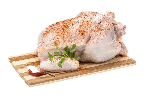 Raw chicken with paprika — Stock Photo, Image