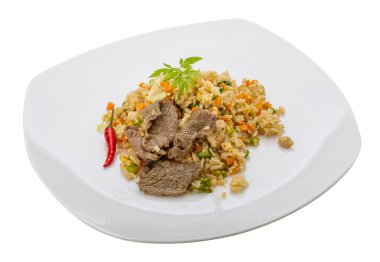 Biftekli kızarmış pirinç.