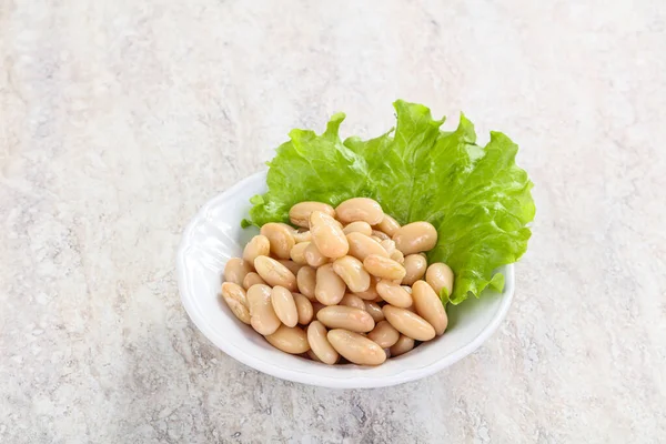 White canned beans for vegan suisine in the bowl