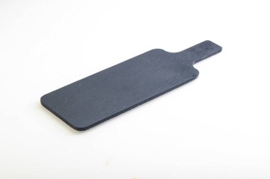 Siyah taş tahtası beyaz arkaplanda izole edildi