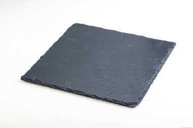 Siyah taş tahtası beyaz arkaplanda izole edildi