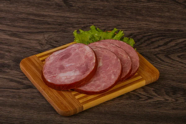 Rodajas Jamón Carne Cerdo Sobre Tabla Madera —  Fotos de Stock