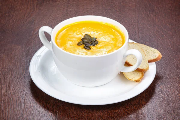 Tasty Pumpkin Soup Seeds Served Bread — Stock Photo, Image