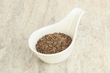 Zira tohumları yemek yapmak için kaseye.