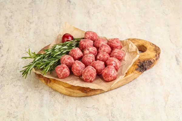 Raw Uncooked Beef Meatballs Served Rosemary Board — Stock Photo, Image