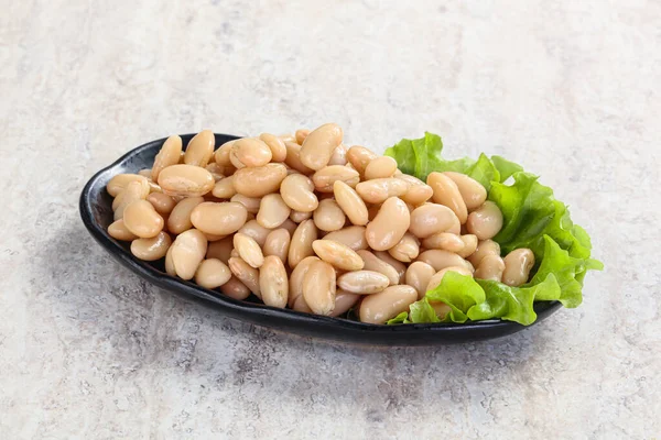 White canned beans for vegan suisine in the bowl