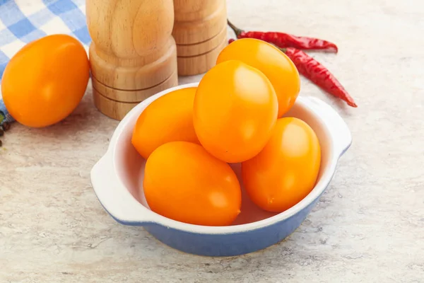 Sweet Ripe Yellow Raw Tomato Bowl Royalty Free Stock Photos