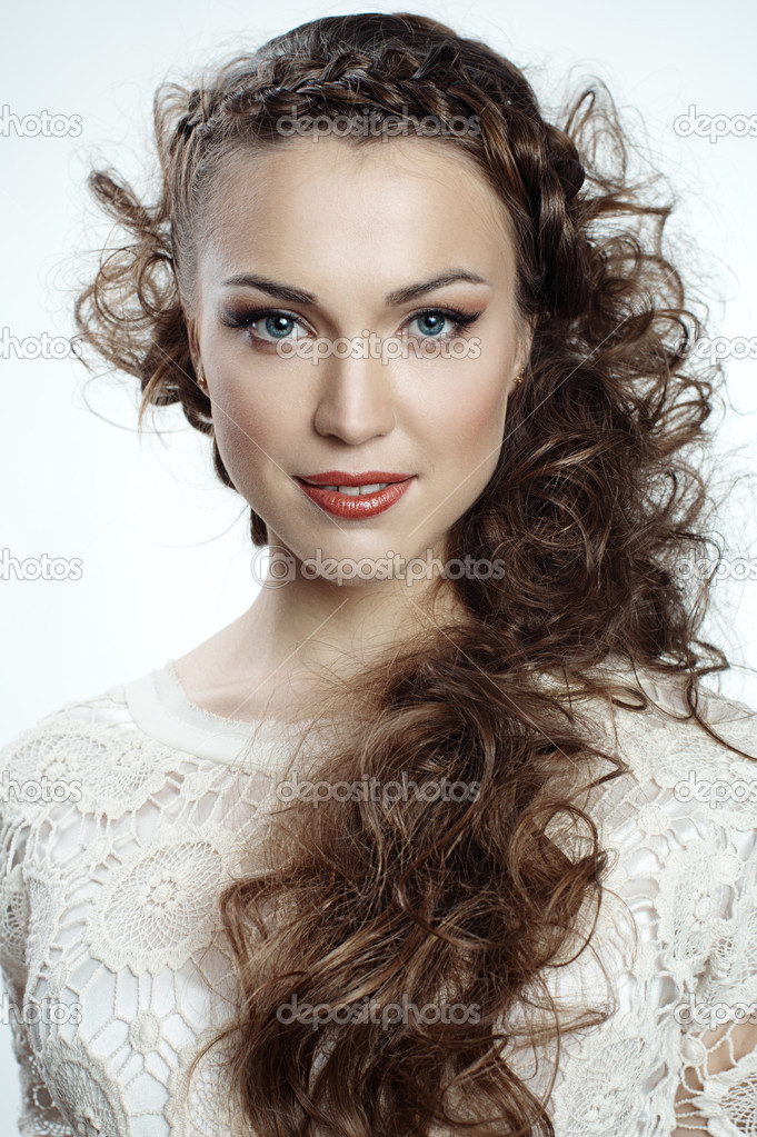 Pretty woman with long curly hair