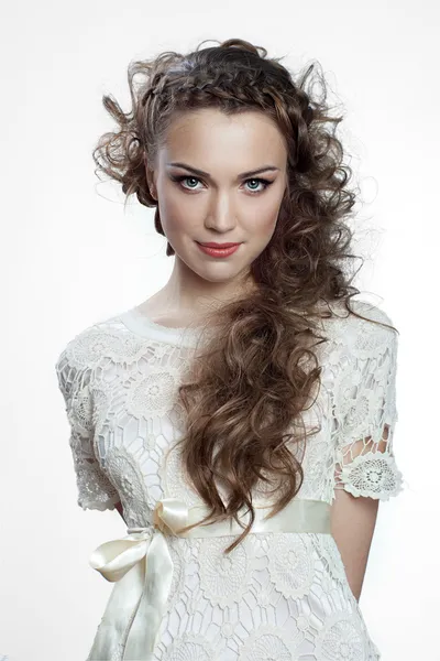 Pretty russian woman with curly hair on white background — Stock Photo, Image