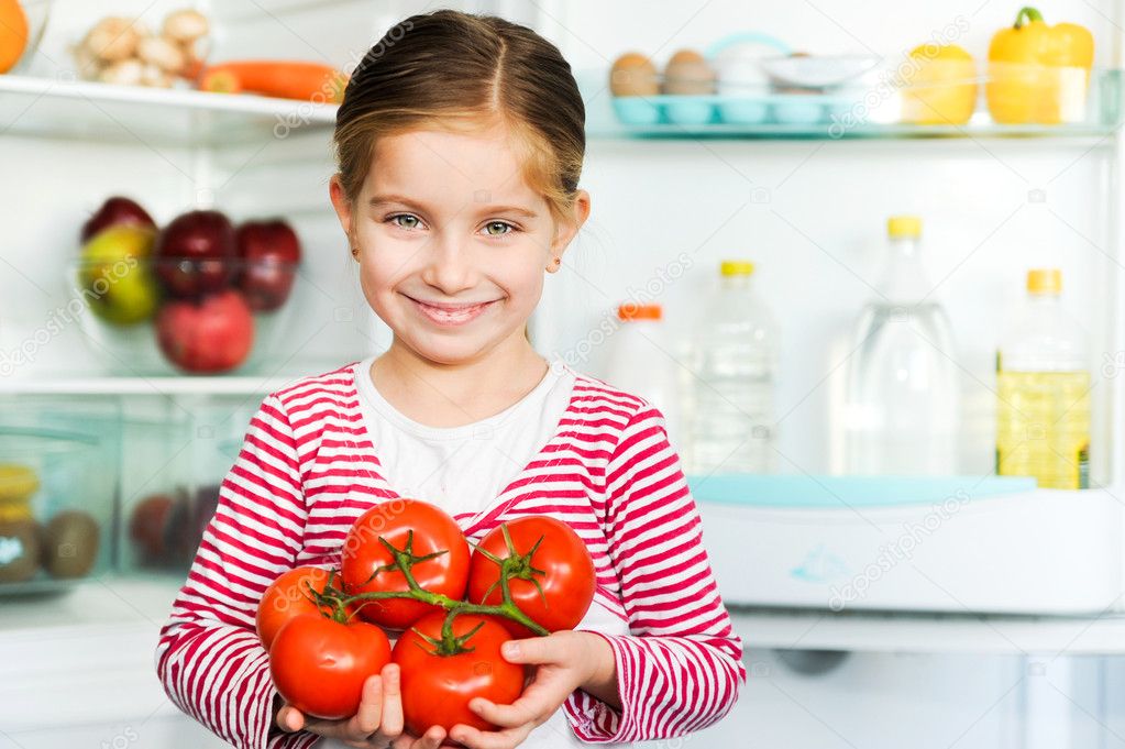 Girl with tomatos