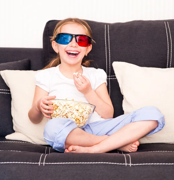 Little girl watching TV — Stock Photo, Image