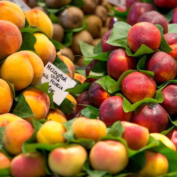 Variety of fruits at the market — Stock Photo, Image