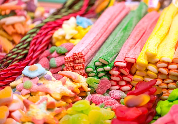 Market stall full of candys — Stock Photo, Image