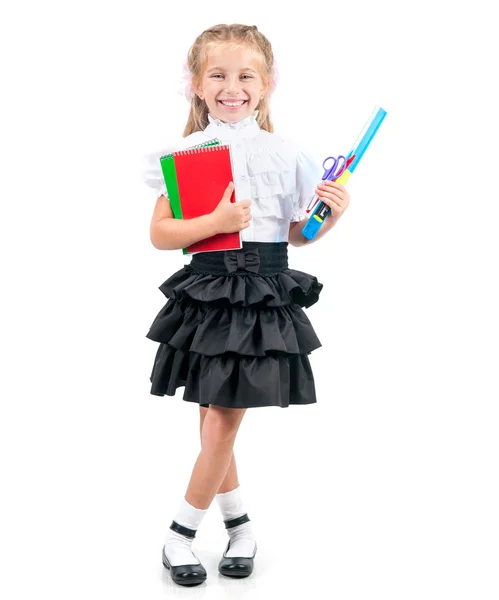 Schattig klein meisje in schooluniform — Stockfoto