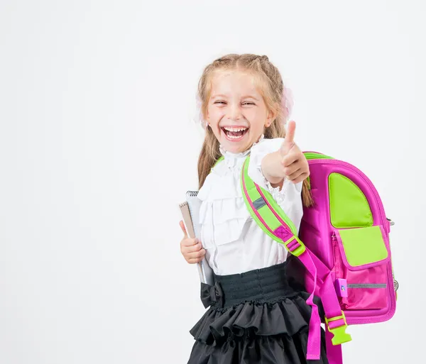 Schattig klein meisje in schooluniform — Stockfoto