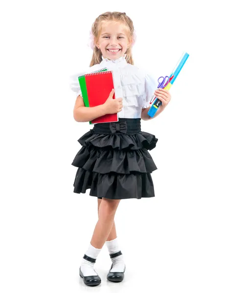 Cute little girl in school uniform Stock Picture