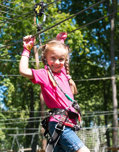 Little girl in a rope park — Stock Photo, Image