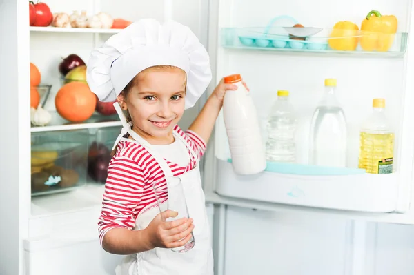 Little girl with milk — Stock Photo, Image