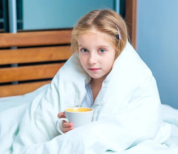 Little girl with a cup — Stock Photo, Image