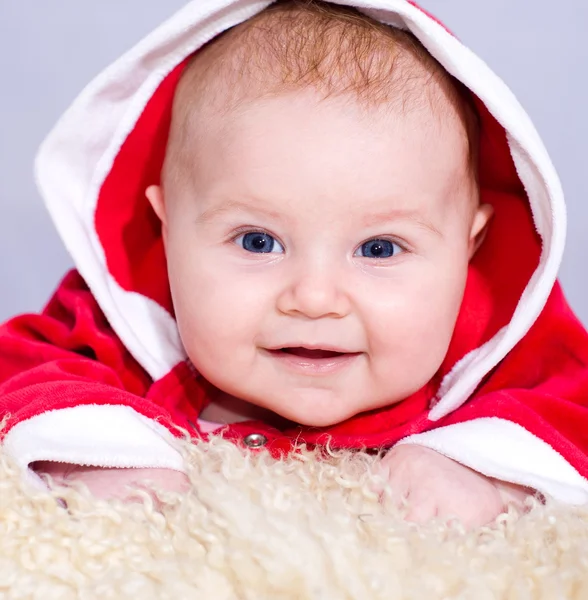 Newborn baby in a Santa drass — Stock Photo, Image