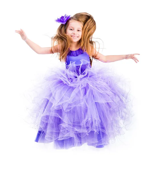 Bambina in un bellissimo vestito viola — Foto Stock