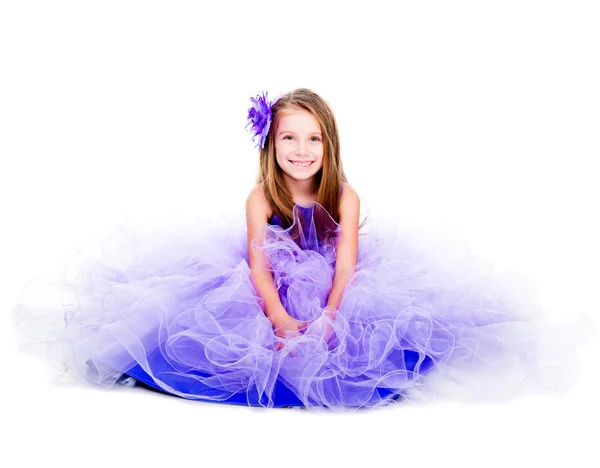 Little girl in a beautiful purple dress — Stock Photo, Image