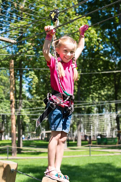 Little girl in a rope park — Stock Photo, Image
