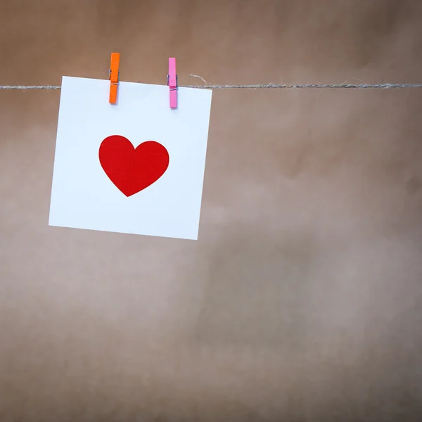 Paper with a red heart — Stock Photo, Image