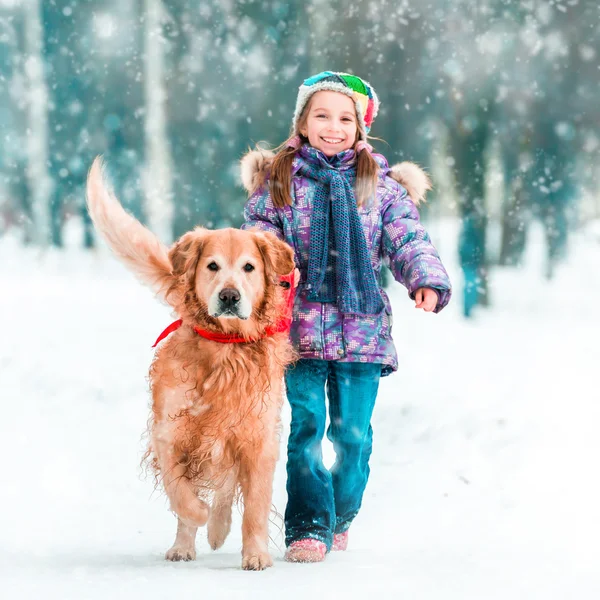 Little girl with her dog Royalty Free Stock Images