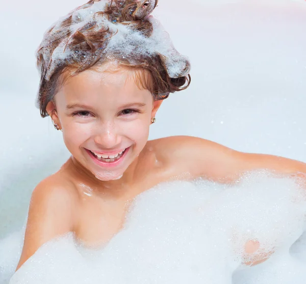 Little girl is taking a bath — 图库照片