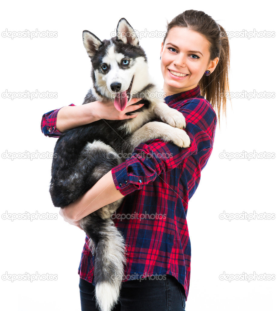 women with her puppy Husky