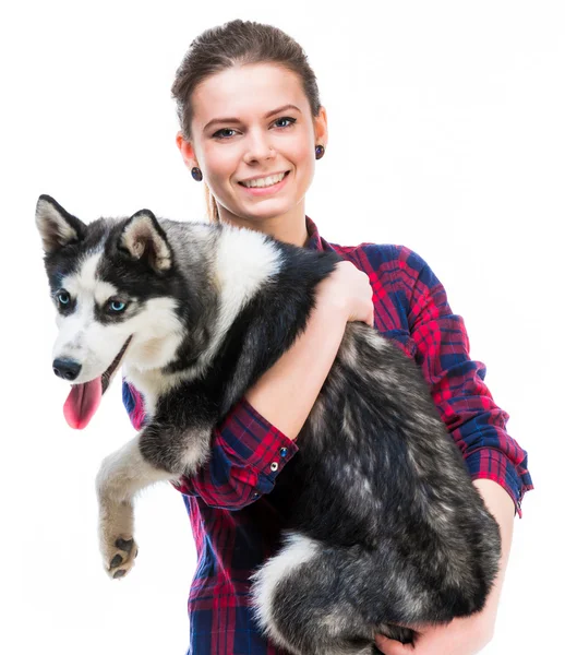 Mulheres com seu filhote Husky — Fotografia de Stock