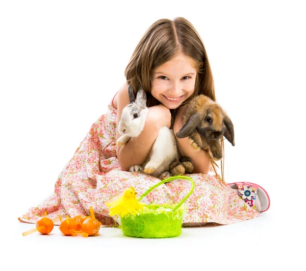 Little girl with her  two rabbits — Stock Photo, Image