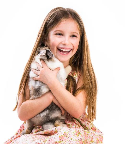 Happy little girl and rabbit — Stock Photo, Image