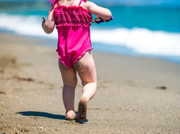 Baby girl on beach — Stock Photo, Image