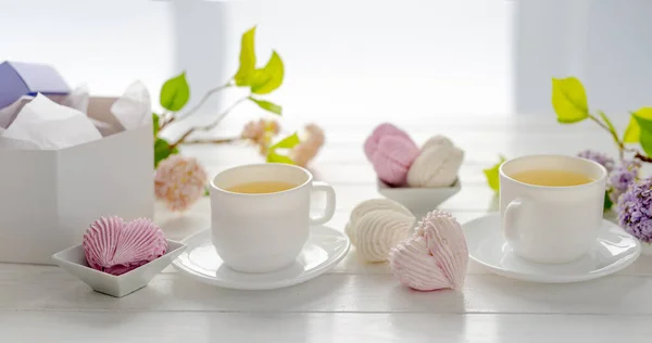 Marshmallow set met thee — Stockfoto