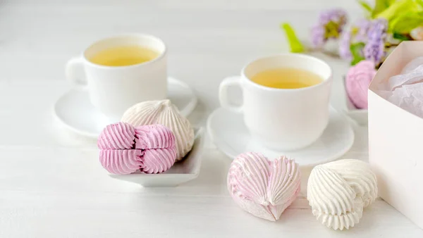 Marshmallow set met thee — Stockfoto