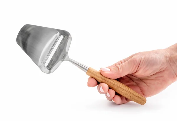 Hand hålla en hård ost kniv isolerad — Stockfoto