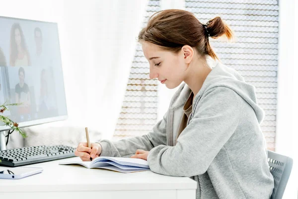 Girl Writing Notebook Remote Educaton Class Video Link Friends Classmates — Stock Photo, Image
