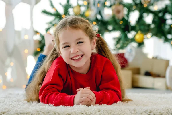 Child Girl Christmas Time Lying Fluffy Carpet Smiling Room Decorated — Stock Photo, Image