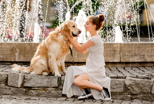 Girl Beautiful Dress Petting Golden Retriever Dog Street Summer Day — Stock Photo, Image