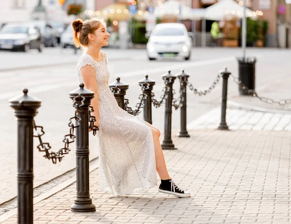 Beautiful Girl Long Dress Sitting Chain Fence Street City Looking — Stockfoto