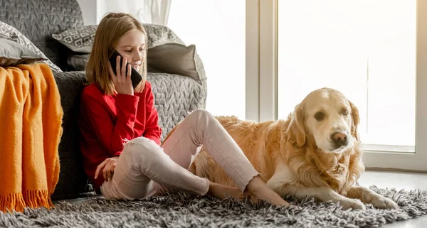 Preteen Girl Holds Smartphone Her Hand Smiles Cheerful Child Spends — стоковое фото