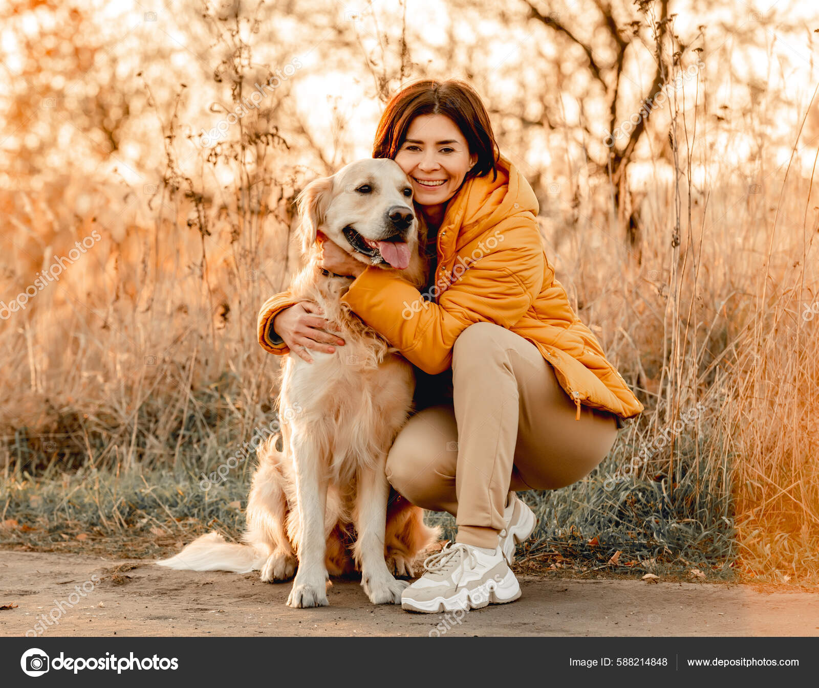 Girl Hugging Golden Retriever Dog Sunset Light Outdoors Young